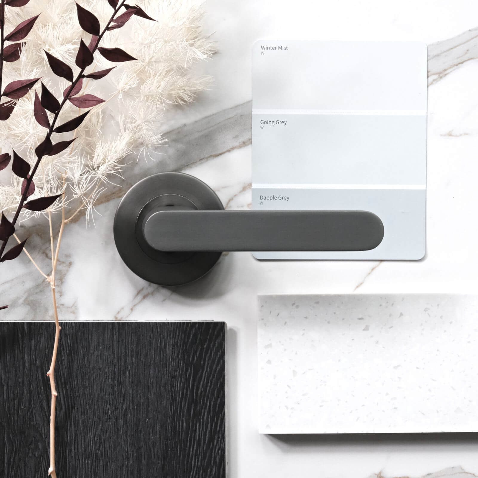 Moodboard with benchtop, paint colour card and Almeri door handle in a brushed gun metal grey finish gun metal grey 11 2