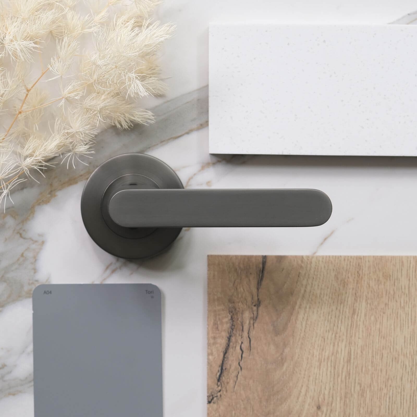 Tori colour card by Taubmans with gun metal grey passage door handle, Hanwood floorboard and Think Benchtops gun metal grey 20